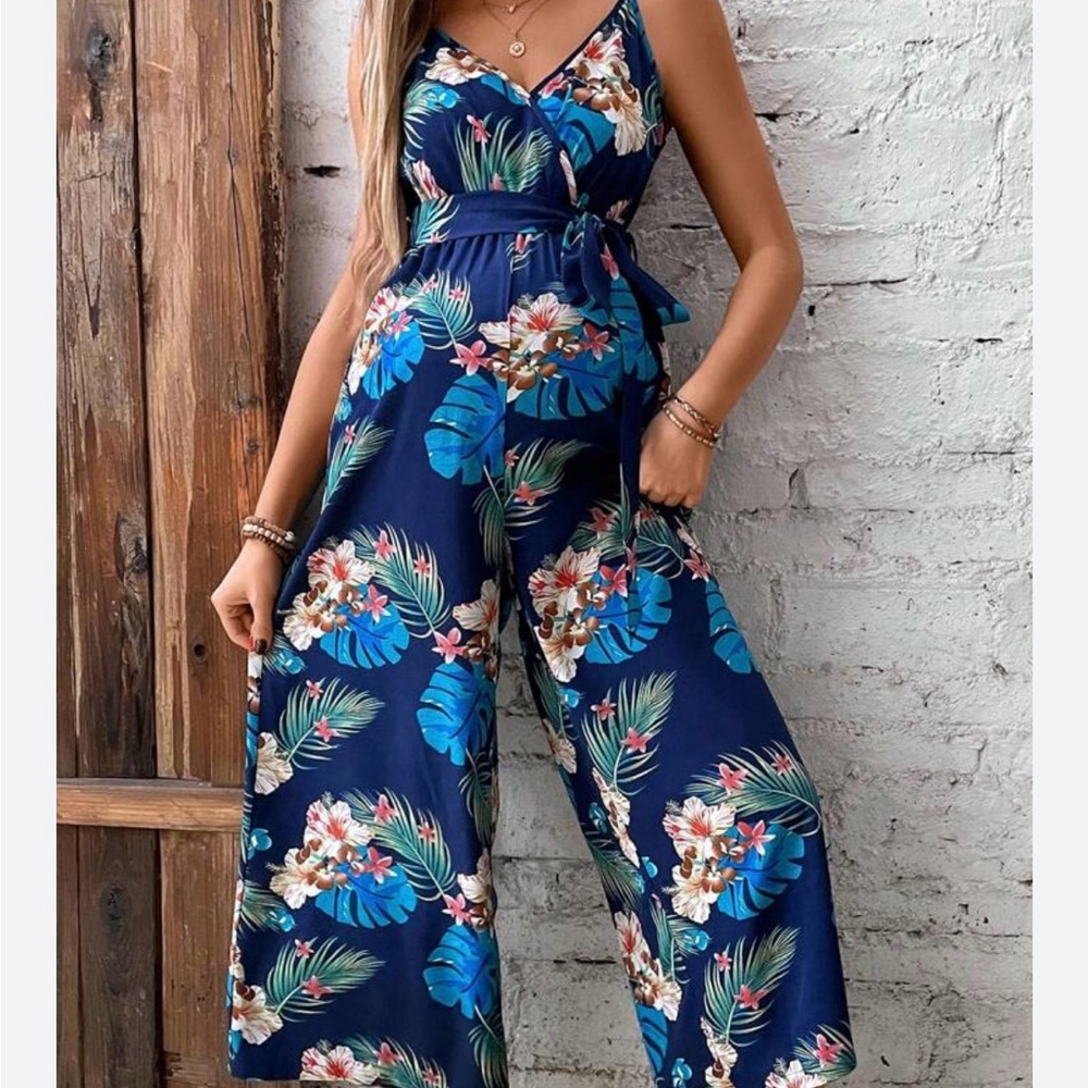 SHEIN. Tropical Printed Jumpsuit. Blue background. Adjustable straps. M.